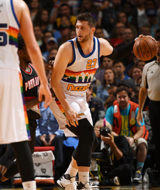 DENVER, CO - OCTOBER 29: Jusuf Nurkic #23 of the Denver Nuggets handles the ball against the Portland Trail Blazers on October 29, 2016 at the Pepsi Center in Denver, Colorado. NOTE TO USER: User expressly acknowledges and agrees that, by downloading and/or using this Photograph, user is consenting to the terms and conditions of the Getty Images License Agreement. Mandatory Copyright Notice: Copyright 2016 NBAE  (Photo by Garrett Ellwood/NBAE via Getty Images)